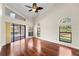 Spacious bedroom boasts vaulted ceiling, view of pool, and arched windows at 2513 Buckhorn Run Dr, Valrico, FL 33596