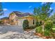 Inviting home featuring a manicured lawn, mature landscaping, and a charming exterior at 2513 Buckhorn Run Dr, Valrico, FL 33596