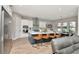 Gourmet kitchen with modern appliances, a large island, and seating for casual dining at 2707 W Fig St, Tampa, FL 33609