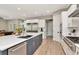 Modern kitchen featuring a large island, stainless steel appliances, and lots of room for cooking at 2707 W Fig St, Tampa, FL 33609