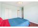 Spacious bedroom with ample closet space, a ceiling fan, and carpet floors at 2757 Via Cipriani # 1121B, Clearwater, FL 33764