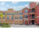 Colorful townhomes offer garages, tiled roofs and lush landscaping at 2757 Via Cipriani # 1121B, Clearwater, FL 33764