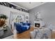 Comfortable living room with a fireplace, stylish seating, and bright patio access at 3212 Alcott Ave, Plant City, FL 33566