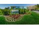 Beautifully landscaped entrance to the Wave condominium complex with lush tropical foliage at 3315 58Th S Ave # 509, St Petersburg, FL 33711