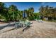 Enjoy the outdoor patio area shaded by palm trees and with umbrella-covered seating at 3315 58Th S Ave # 509, St Petersburg, FL 33711