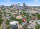 Drone shot shows a vibrant city with lush green trees and various buildings at 337 S Plant Ave, Tampa, FL 33606