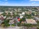 Wide angle aerial view showcasing the city with mature trees, buildings, and a vibrant neighborhood at 337 S Plant Ave, Tampa, FL 33606