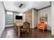 Stylish dining room with modern lighting, stone accent wall, and comfortable seating at 337 S Plant Ave, Tampa, FL 33606