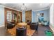 Inviting living room with stone fireplace, elegant chandelier, and cozy seating arrangement at 337 S Plant Ave, Tampa, FL 33606