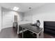Office featuring desk, chair, and shelving at 337 S Plant Ave, Tampa, FL 33606
