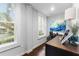 Bright office with large windows and dark wooden floors at 337 S Plant Ave, Tampa, FL 33606