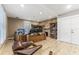 Office space featuring exposed brick, rustic wood desk, tile floors and natural light at 337 S Plant Ave, Tampa, FL 33606