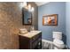 Chic powder room with unique tile accent wall, modern vanity, and stylish fixtures at 337 S Plant Ave, Tampa, FL 33606