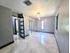 Spacious bedroom with tiled flooring, modern lighting and recessed lights at 3911 6Th W Ave, Palmetto, FL 34221