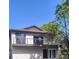 Contemporary home boasts sleek design, second story balcony, and large windows for plenty of natural light at 3911 6Th W Ave, Palmetto, FL 34221