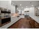 Contemporary kitchen boasting stainless steel appliances, custom cabinets, and ample counter space at 4014 W Swann Ave, Tampa, FL 33609
