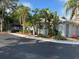 Charming condo with tropical landscaping, a screened in lanai and an attached one car garage at 4127 Dolphin Dr # 4127, Tampa, FL 33617