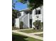 Charming condo featuring neutral paint, well-maintained landscaping, and an inviting entrance at 4127 Dolphin Dr # 4127, Tampa, FL 33617