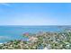 Breathtaking aerial view of a coastal community with waterfront homes, scenic waterways, and stunning bay views at 4710 W El Prado Blvd, Tampa, FL 33629