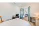 Comfortable bedroom with french doors and a view of the home's interior at 4710 W El Prado Blvd, Tampa, FL 33629