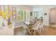 Bright dining room with modern windows, stylish decor, and a cozy table setting for Gathering gatherings at 4710 W El Prado Blvd, Tampa, FL 33629