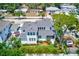 Beautiful home with mature trees, lush landscaping, and a backyard pool, offering a serene outdoor retreat at 4710 W El Prado Blvd, Tampa, FL 33629