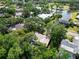 Panoramic aerial view captures the home's desirable location with surrounding greenery and neighborhood landscape at 495 Palmdale Dr, Oldsmar, FL 34677