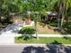 Beautiful front yard with manicured lawn and landscaping, enhancing the curb appeal of this charming home at 495 Palmdale Dr, Oldsmar, FL 34677