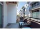 Balcony space featuring wicker furniture, and exterior of modern townhouses at 5008 S Macdill Ave # 10, Tampa, FL 33611
