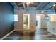 Upstairs bedroom with exposed ceilings opens to bathroom with walk-in shower at 5008 S Macdill Ave # 10, Tampa, FL 33611