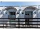 Townhouse exterior featuring balconies, modern design, and ample natural light at 5008 S Macdill Ave # 10, Tampa, FL 33611