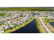 An aerial view of the community, showing the pool and lake views at 5814 Silver Sun Dr, Apollo Beach, FL 33572