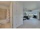 Upstairs hall features a bathroom and large living space with water views at 5814 Silver Sun Dr, Apollo Beach, FL 33572