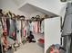 Walk-in closet with built-in shelving and ample storage at 5814 Silver Sun Dr, Apollo Beach, FL 33572