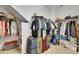 Walk-in closet with upper and lower shelving and plenty of storage space at 5814 Silver Sun Dr, Apollo Beach, FL 33572