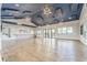 Spacious community center room with modern lighting fixtures and ample natural light at 5814 Silver Sun Dr, Apollo Beach, FL 33572