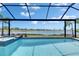 Relaxing screened pool overlooking tranquil lake views at 5814 Silver Sun Dr, Apollo Beach, FL 33572