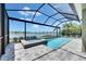 Beautiful screened in pool and lake view at 5814 Silver Sun Dr, Apollo Beach, FL 33572