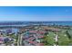 Stunning aerial view showcasing the beautiful waterfront condos, golf course and water features at 6059 Bahia Del Mar Blvd # 235, St Petersburg, FL 33715