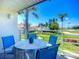 Relaxing balcony view of the lush golf course and landscaped surroundings at 6059 Bahia Del Mar Blvd # 235, St Petersburg, FL 33715