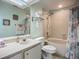 Clean bathroom with a shower-tub combo, vanity with ample counter space, and bright lighting at 6059 Bahia Del Mar Blvd # 235, St Petersburg, FL 33715