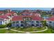 Well-maintained condo community with lush lawns and tropical landscaping near the waterfront at 6059 Bahia Del Mar Blvd # 235, St Petersburg, FL 33715