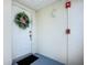 Close up of the front door featuring a wreath and clean facade at 6059 Bahia Del Mar Blvd # 235, St Petersburg, FL 33715