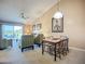 Bright living room with vaulted ceilings and a dining area that features views of the golf course at 6059 Bahia Del Mar Blvd # 235, St Petersburg, FL 33715