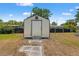 Storage shed in backyard provides additional space for your tools and equipment at 6424 Ponder Dr, Port Richey, FL 34668