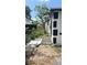 Backyard with partial fence and patio area at 7017 Baywood Dr, Tampa, FL 33637