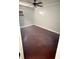 Bedroom featuring hardwood floors, ceiling fan, and one window at 7017 Baywood Dr, Tampa, FL 33637