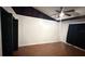 Spacious bedroom with hardwood floors, a ceiling fan, and ample closet space at 7017 Baywood Dr, Tampa, FL 33637