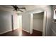 Bedroom with neutral walls, ceiling fan, and closet at 7017 Baywood Dr, Tampa, FL 33637