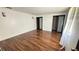 Bedroom with hardwood floors and dual closets at 7017 Baywood Dr, Tampa, FL 33637
